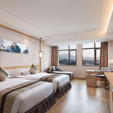 Hotel Ramada Plaza By Wyndham Enshi Esterno foto